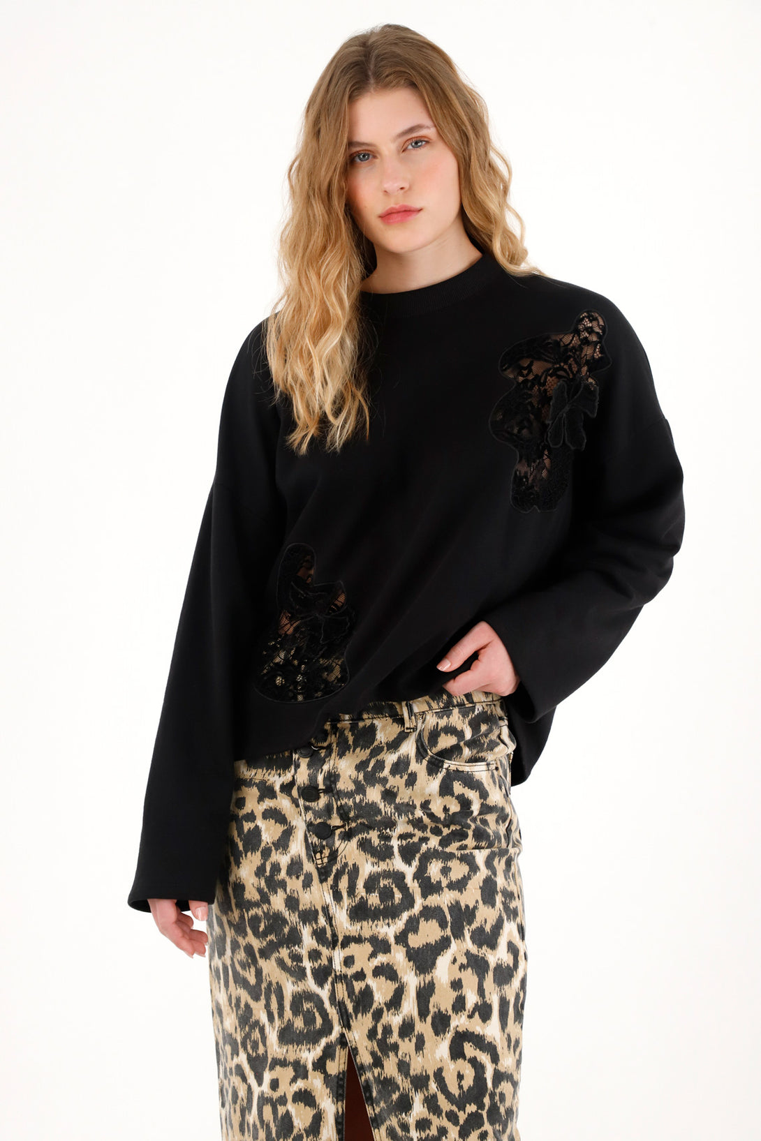 Women's black sweatshirt with embroidered details