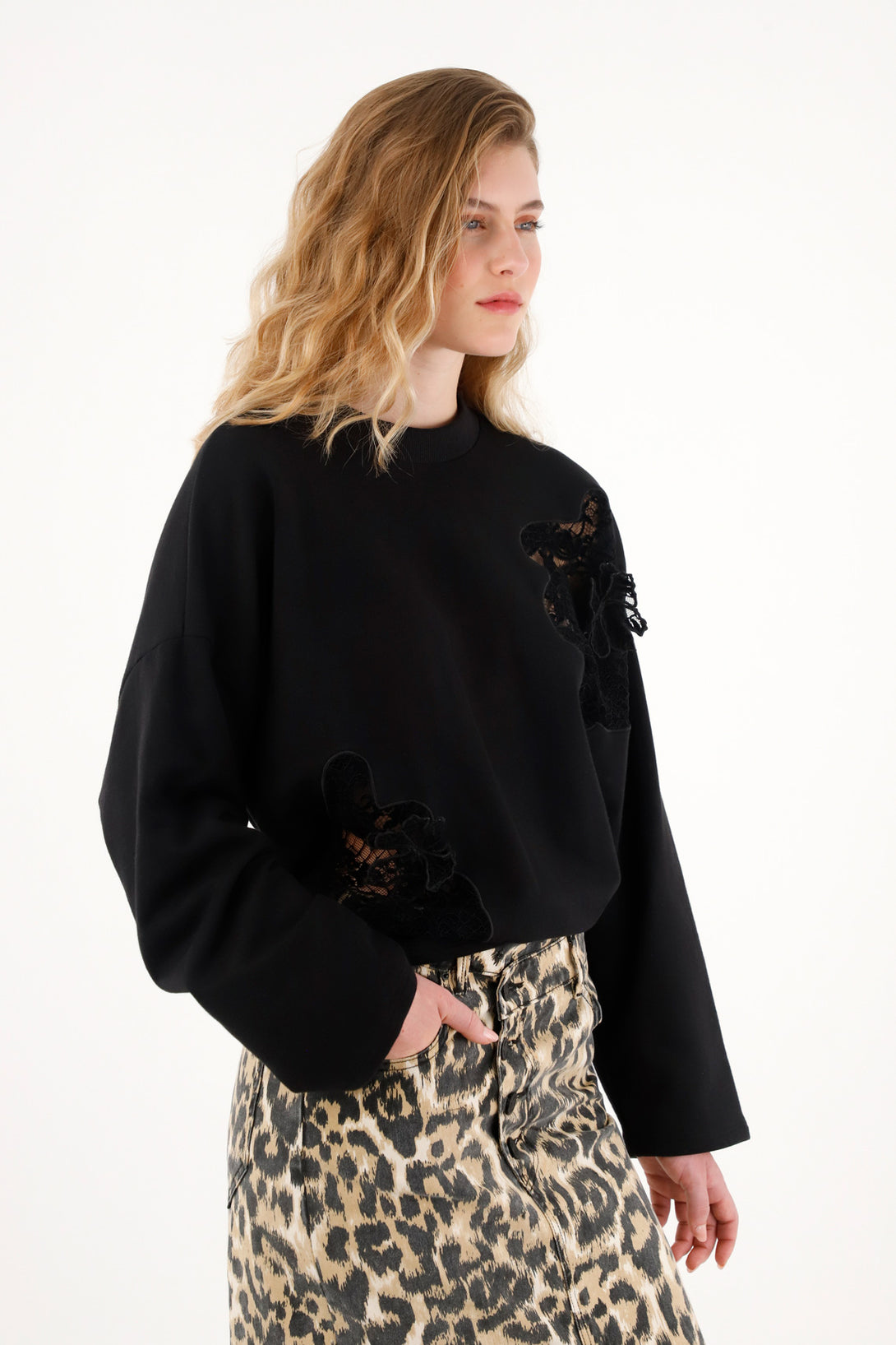 Women's black sweatshirt with embroidered details