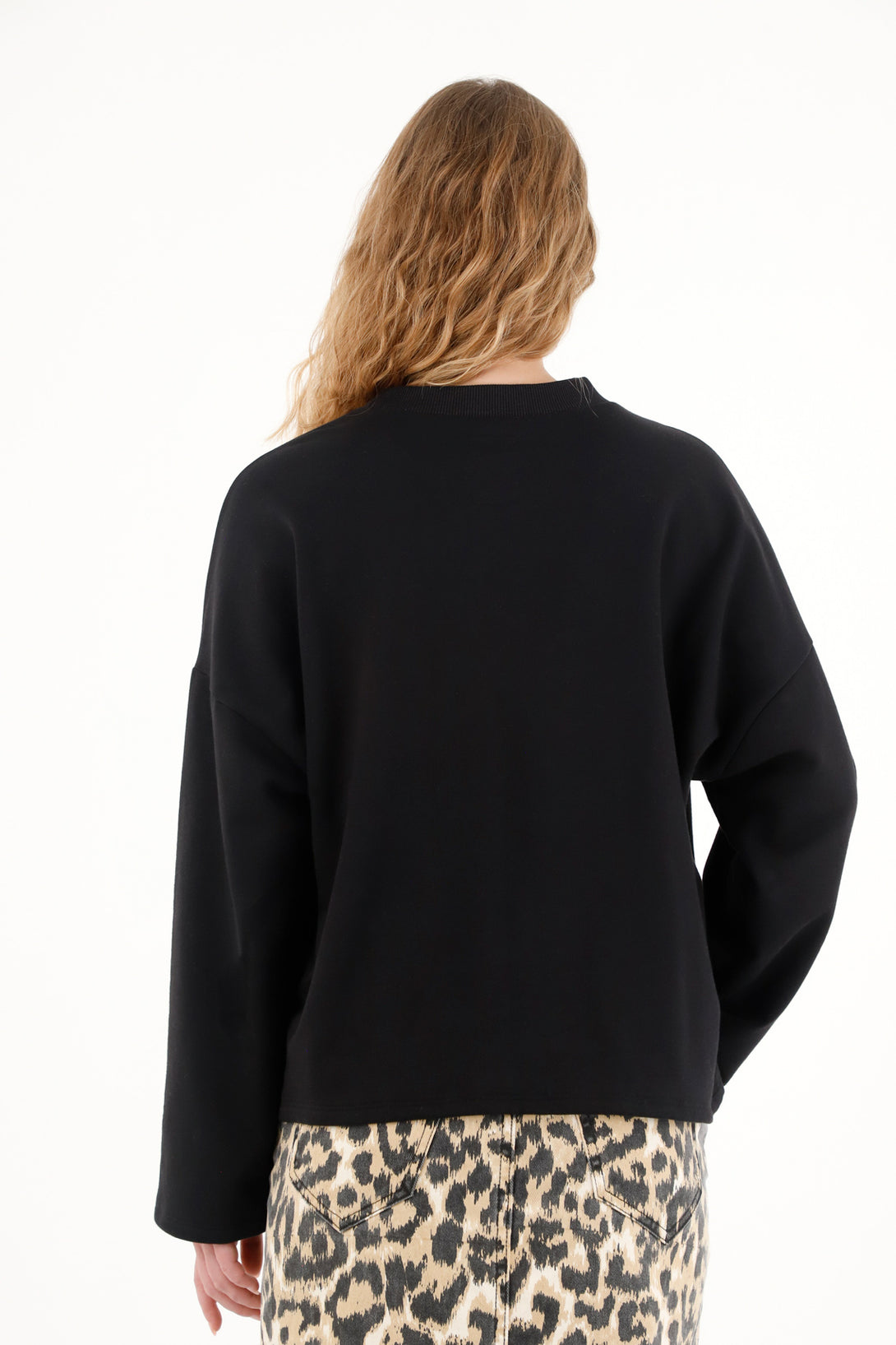 Women's black sweatshirt with embroidered details