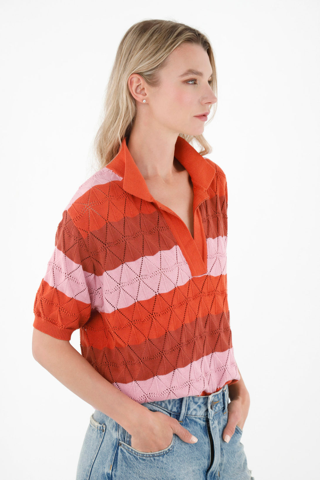 Camisa naranja tipo polo para mujer