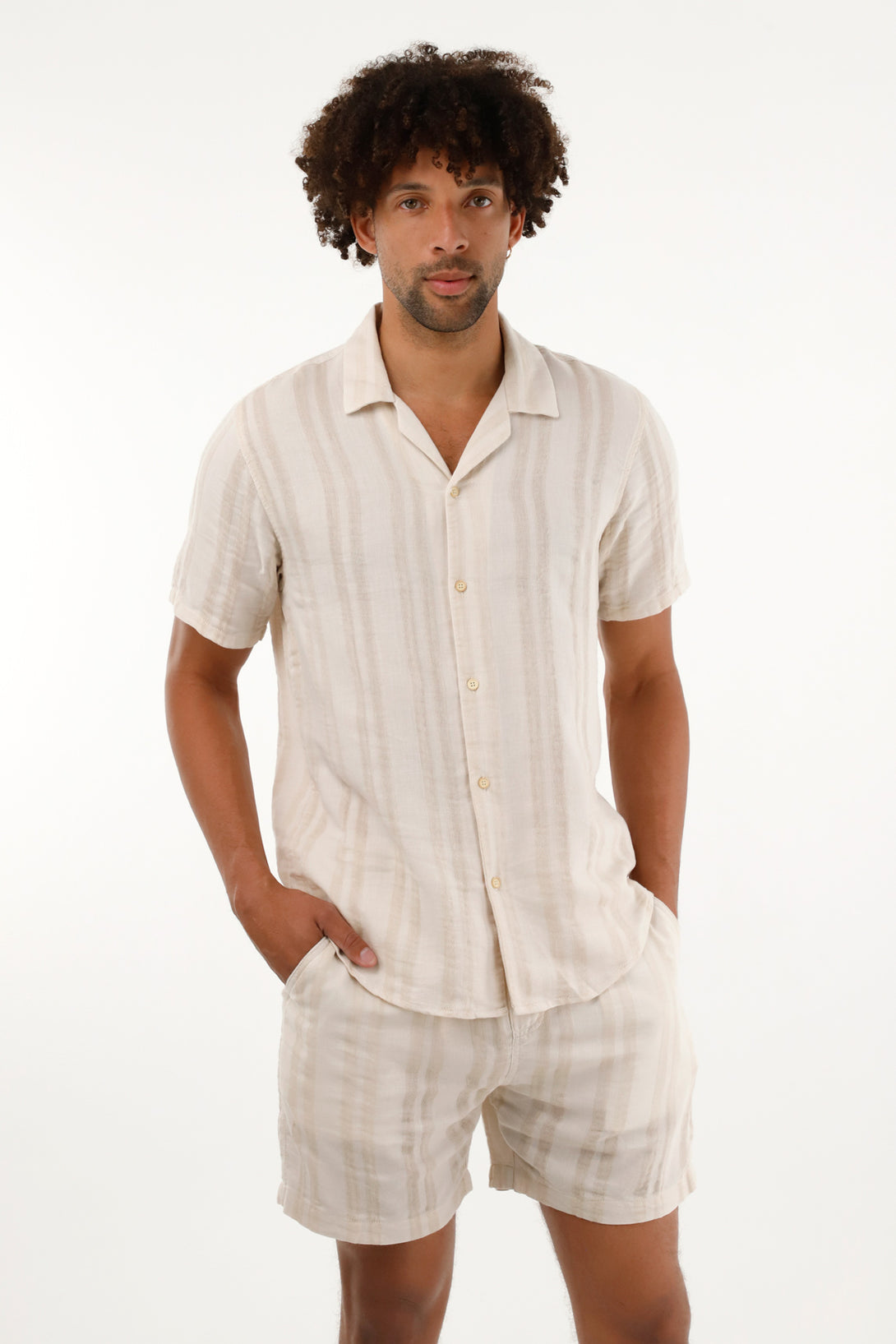 Men's striped bowling shirt in cream.