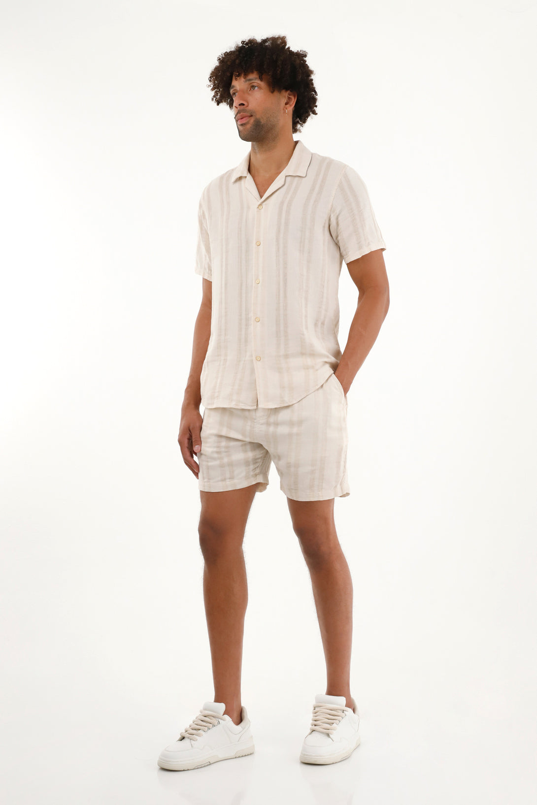 Men's striped bowling shirt in cream.