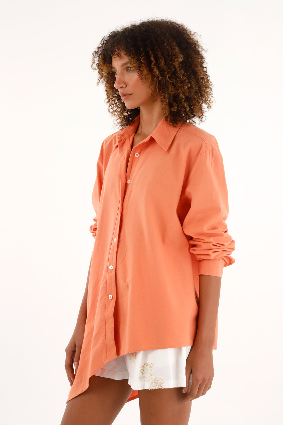 Classic collar orange shirt made of 100% cotton for women.