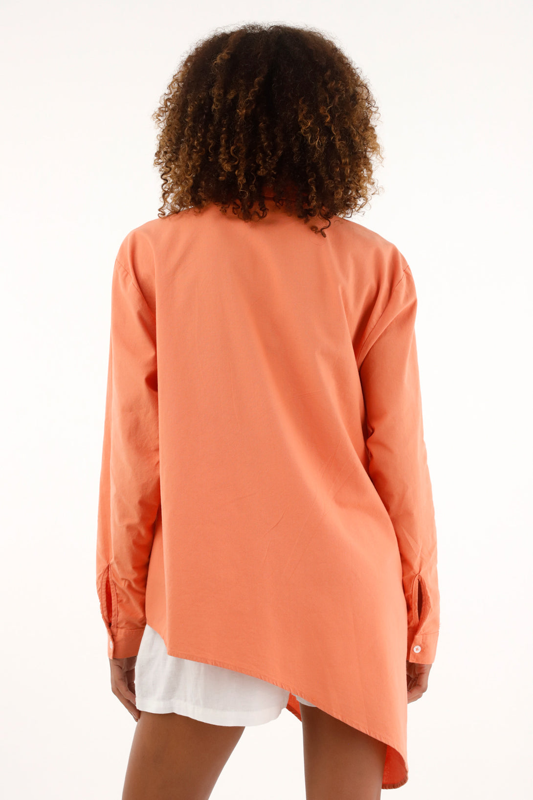 Classic collar orange shirt made of 100% cotton for women.