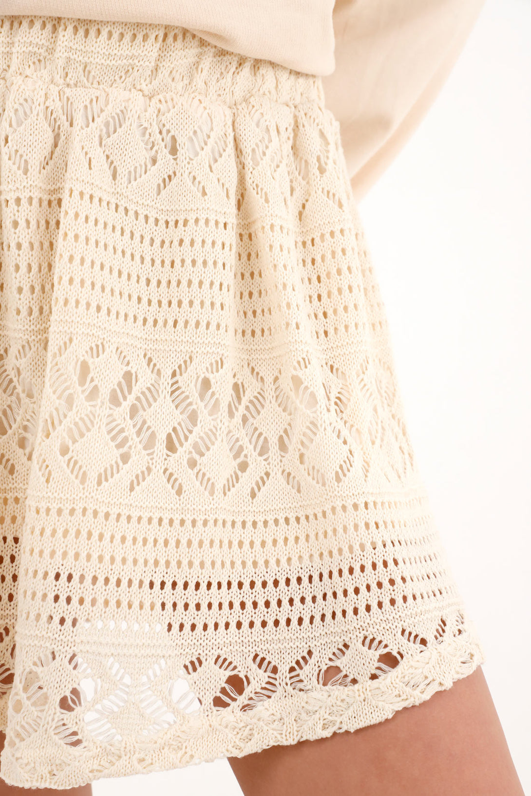 Women's beige knitted mini skirt