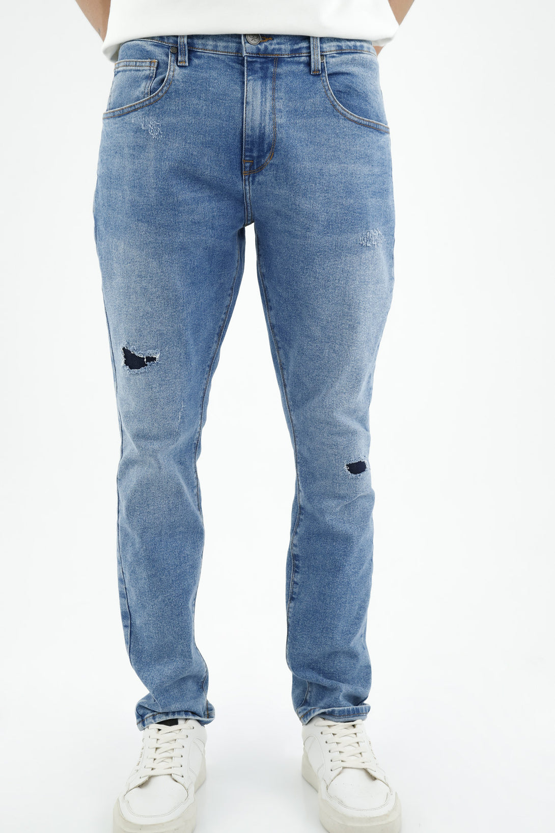 Jean azul con rotos para hombre