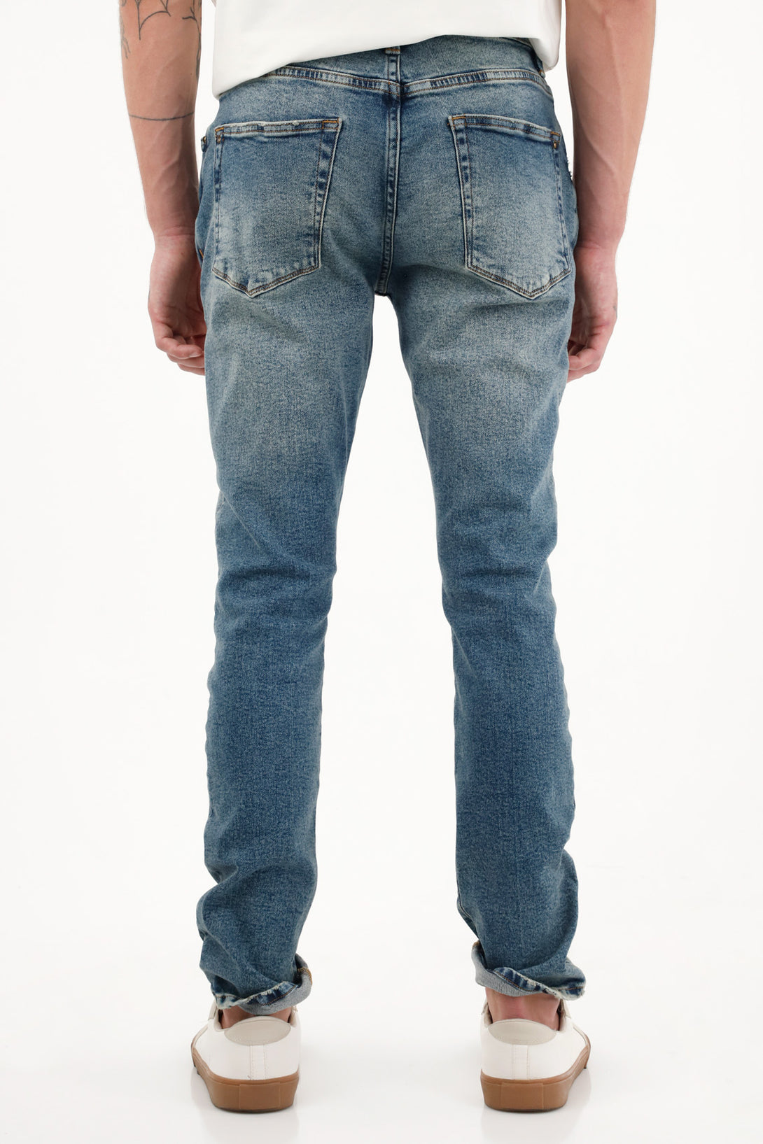 Jean Skinny tiro medio con rotos para hombre