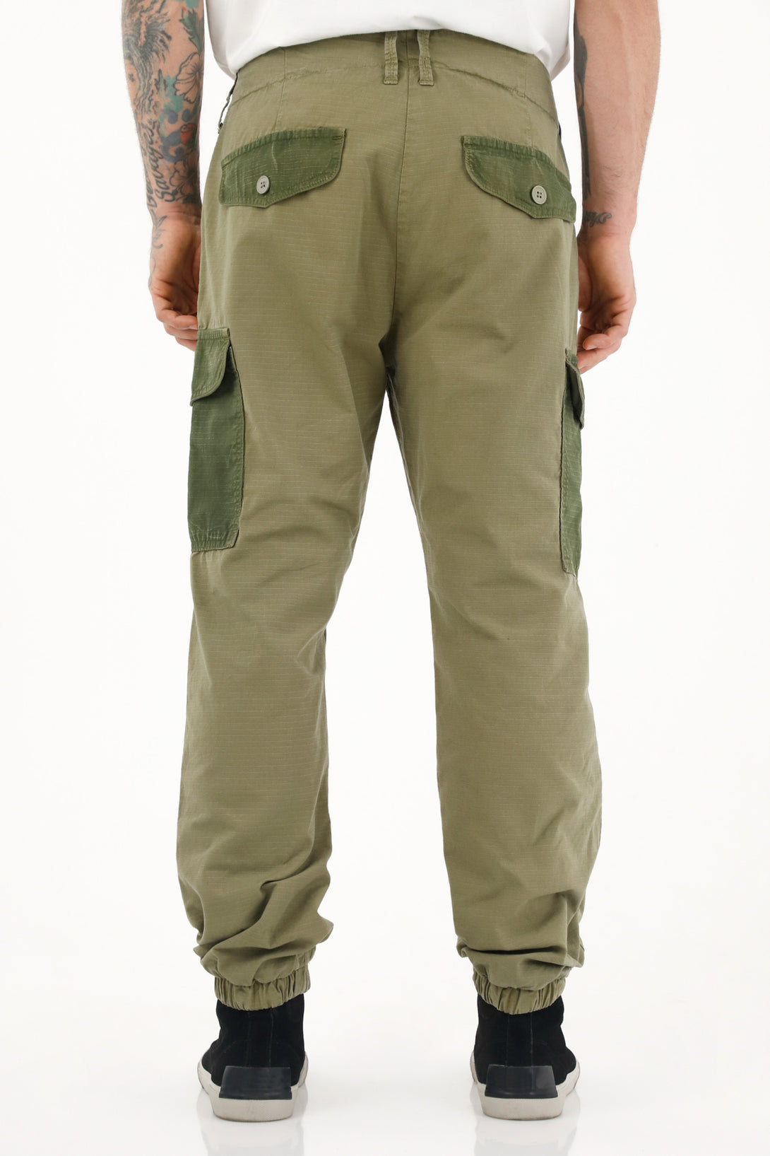 Men's green patchwork pants with cuffed hems