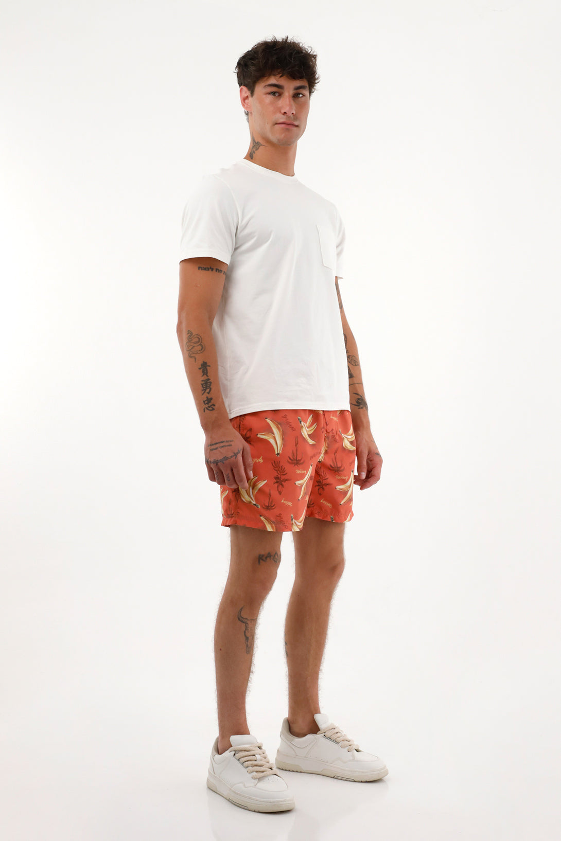 Pantaloneta de baño con estampado de bananas para hombre