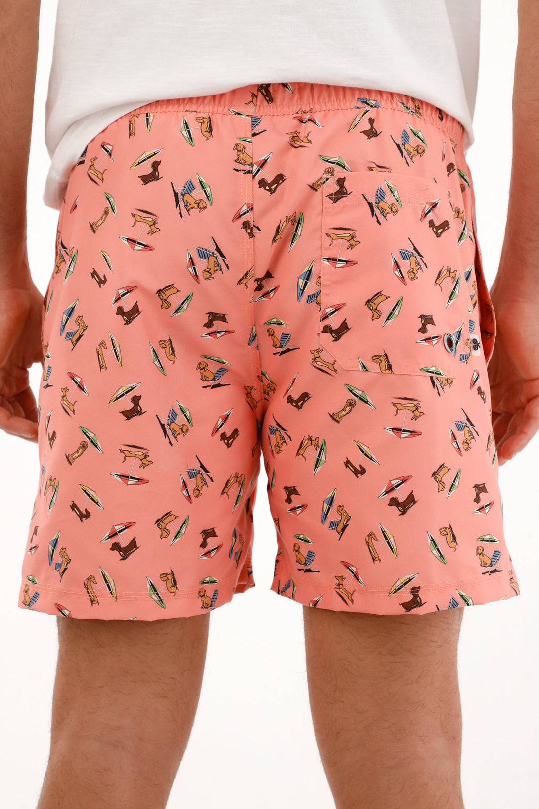 Pink swim trunks with a dachshund print for men