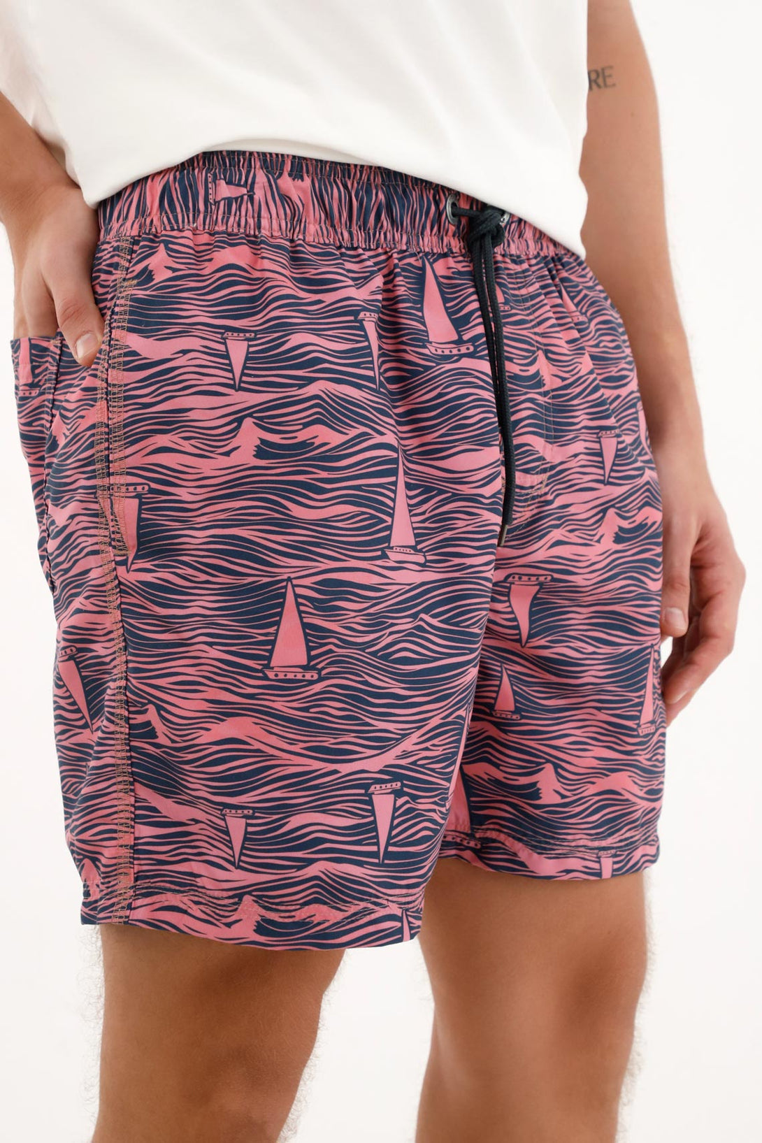 Men's pink sailboat print swim trunks