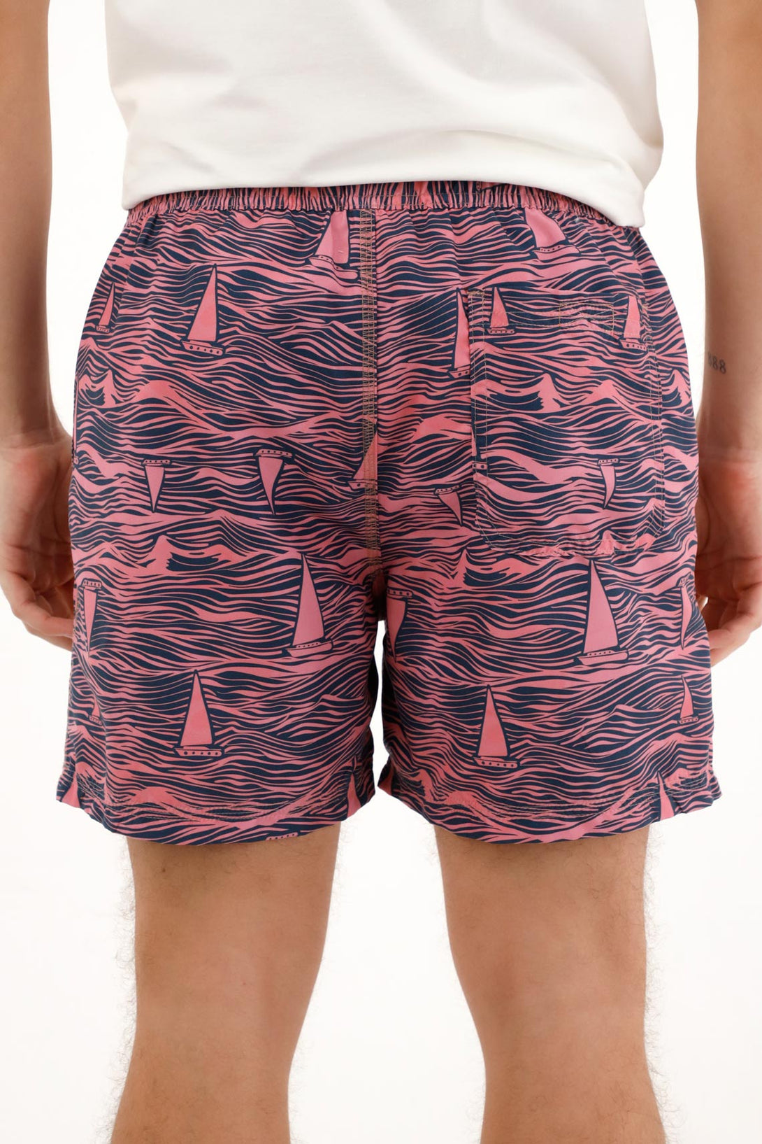 Men's pink sailboat print swim trunks