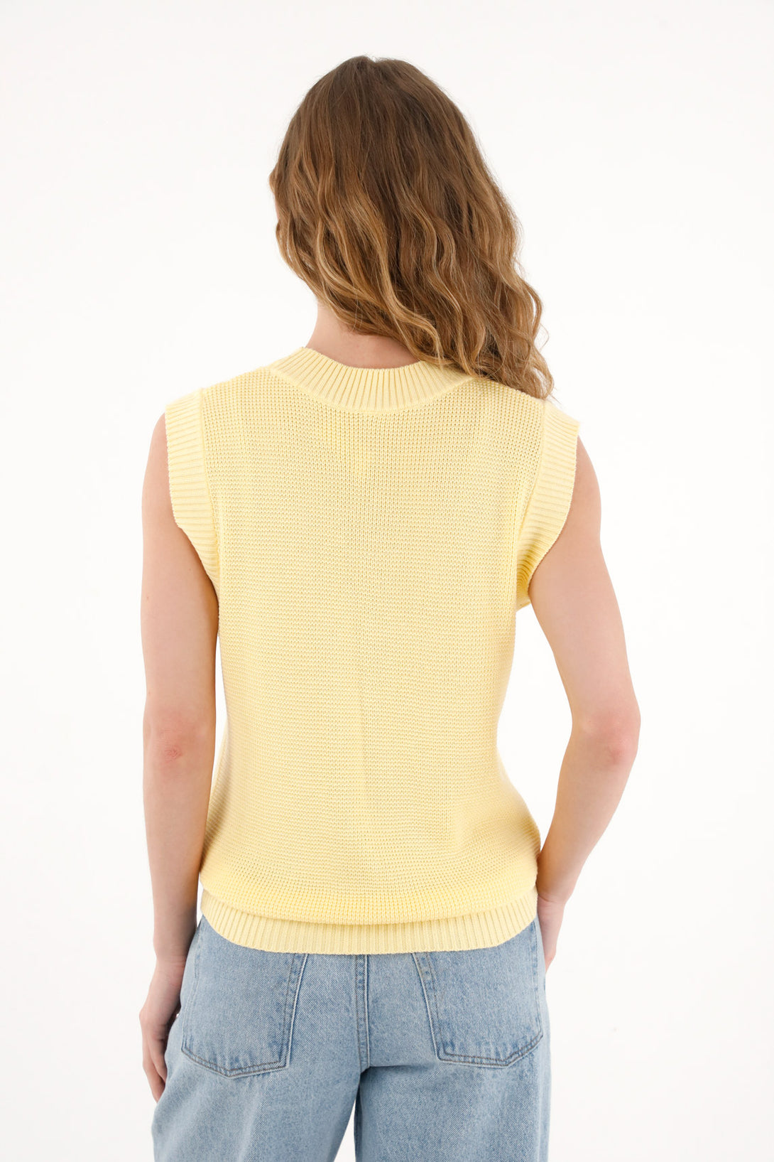 Women's yellow knitted vest