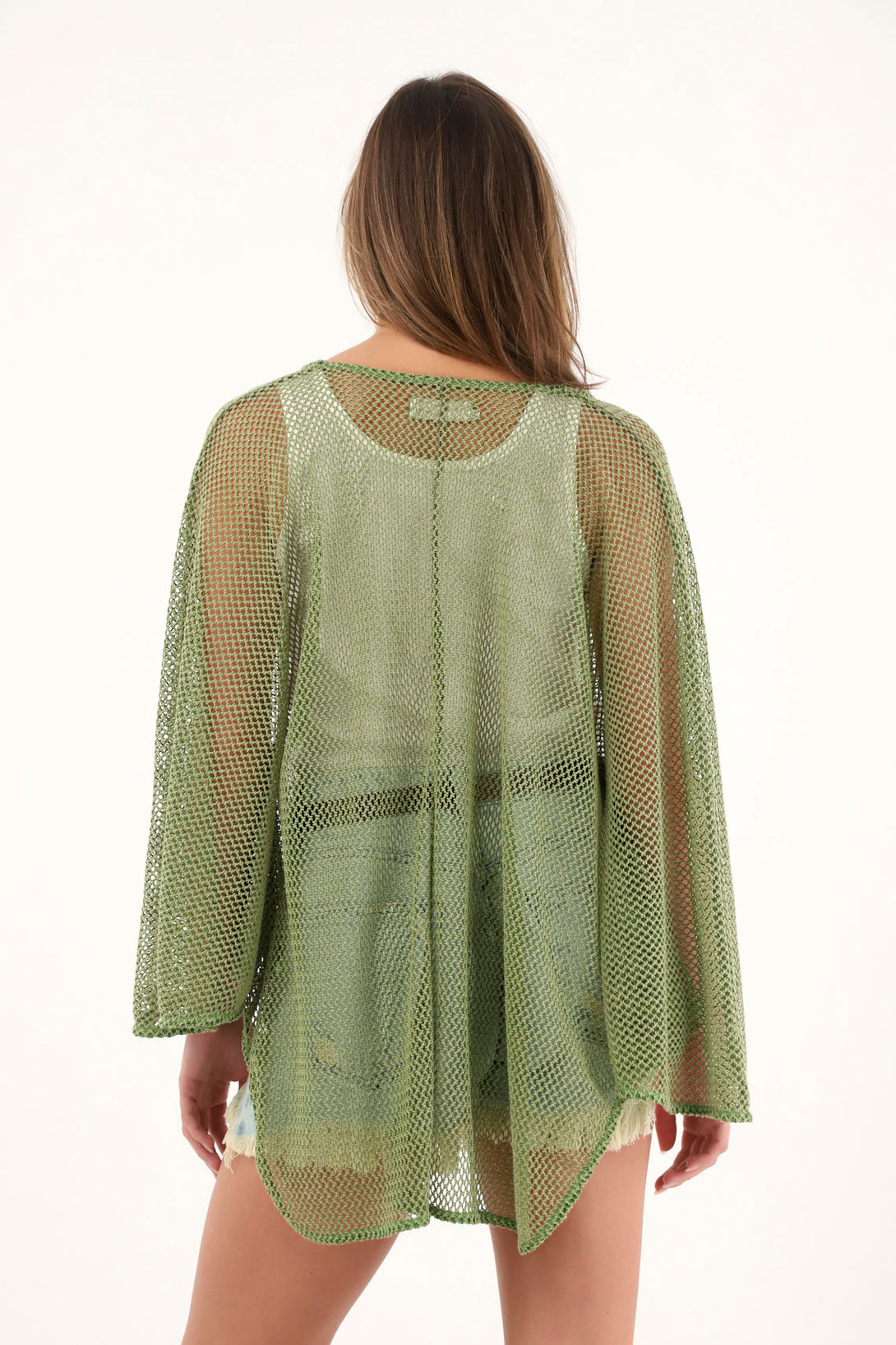 Poncho verde oversize en tela tipo malla para mujer