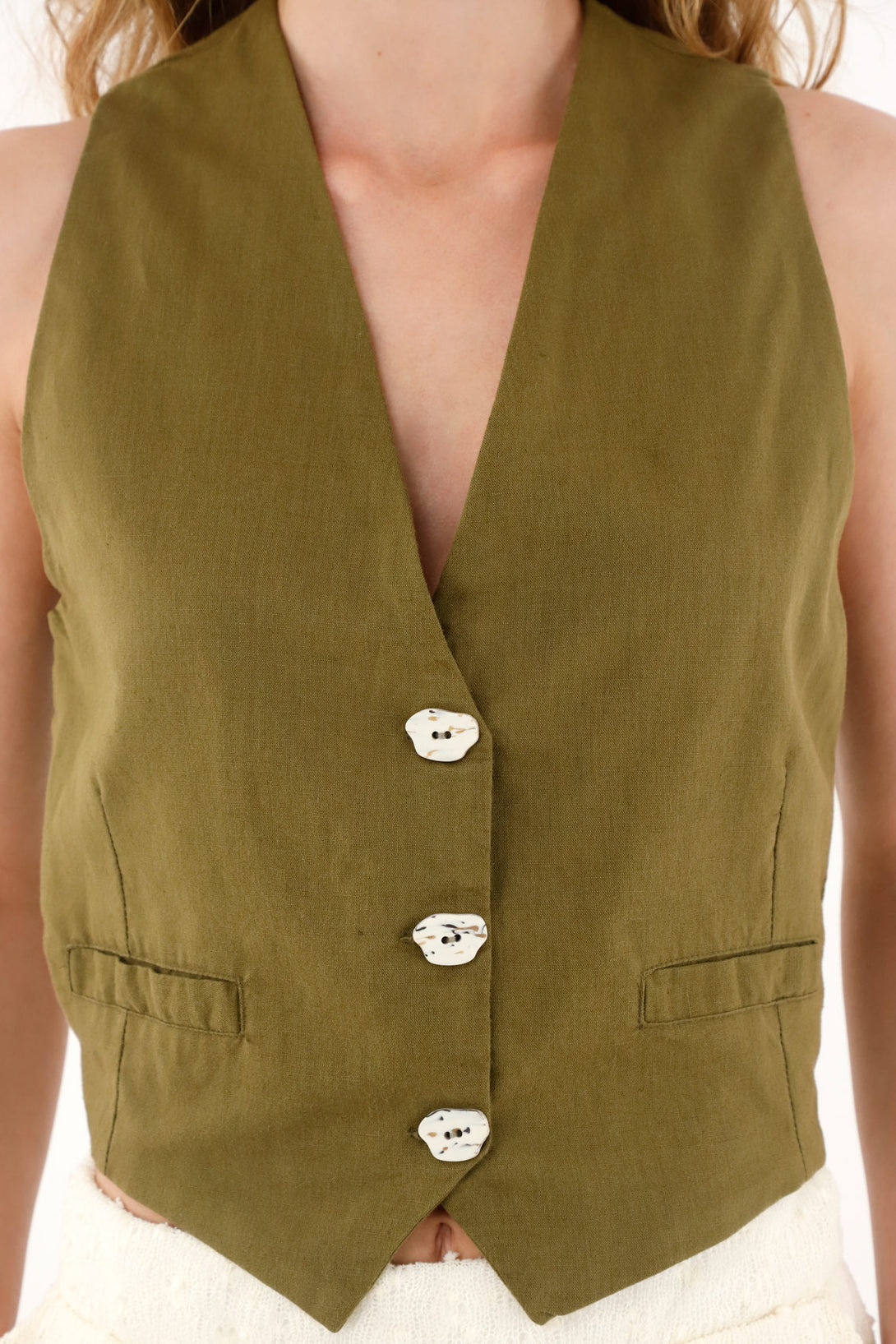 Women's green button-up vest