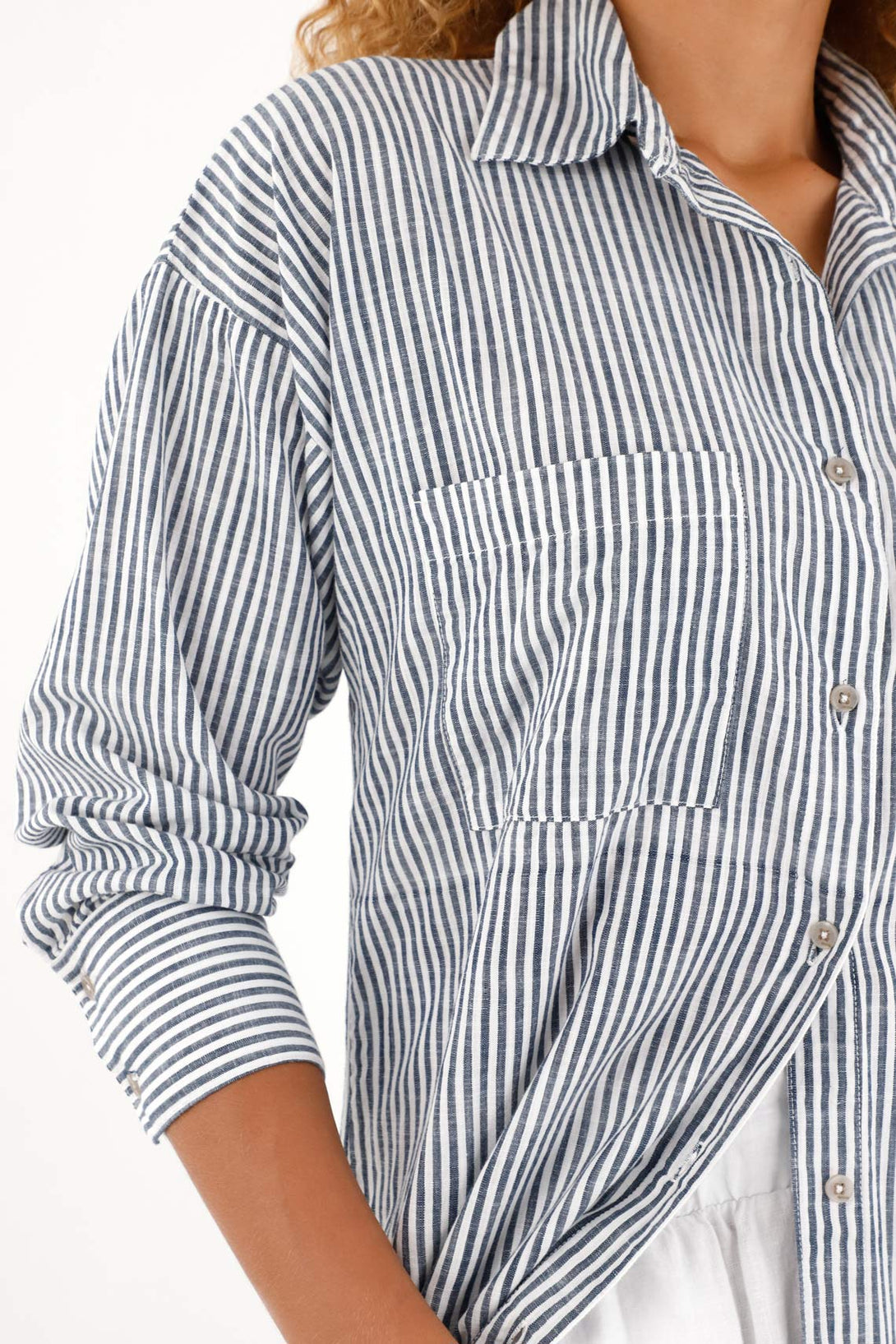 Women's long-sleeve blue striped print shirt.