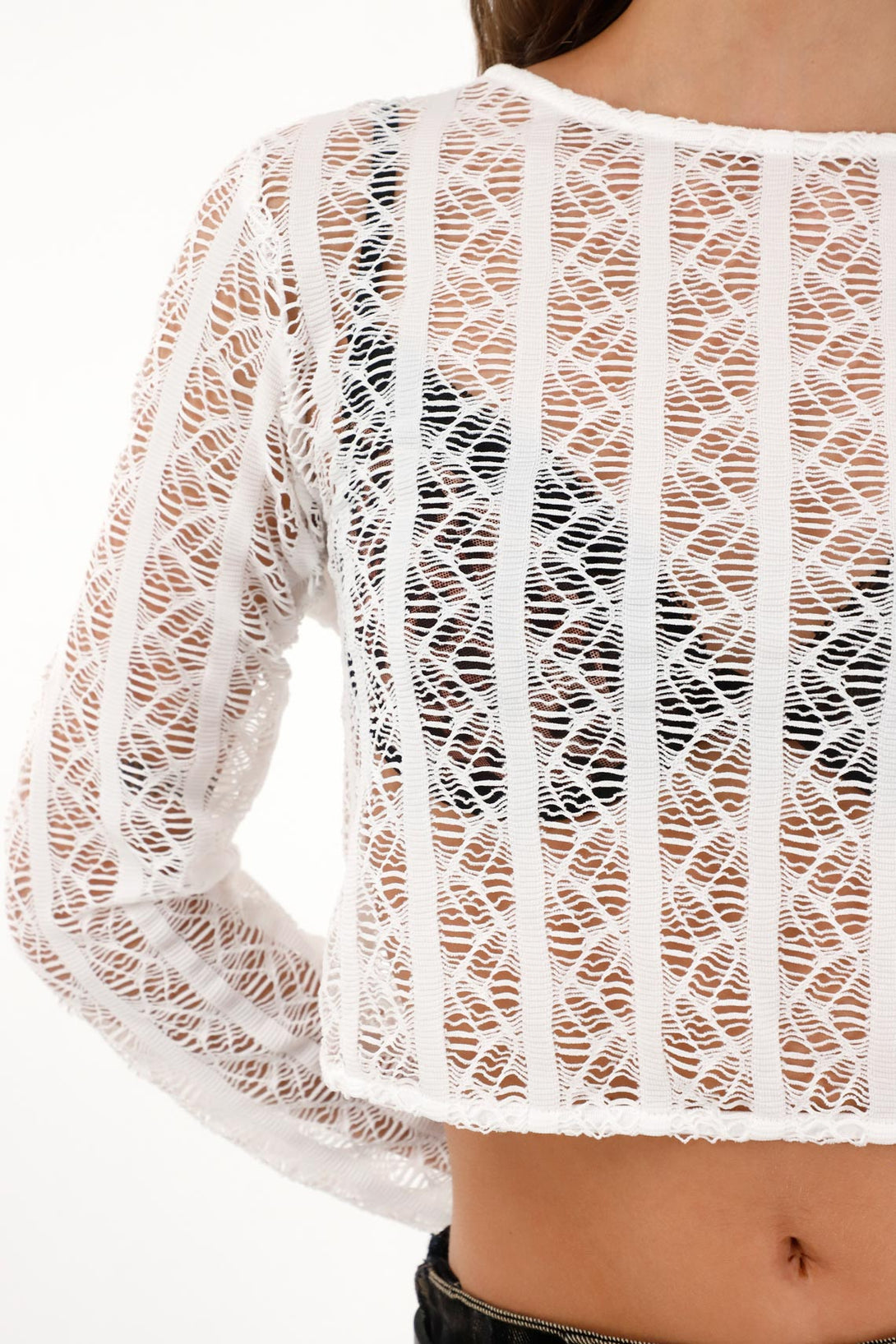 Women's long sleeve mesh fabric T-shirt in raw white.